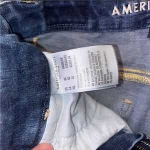American eagle dark blue distressed jeans